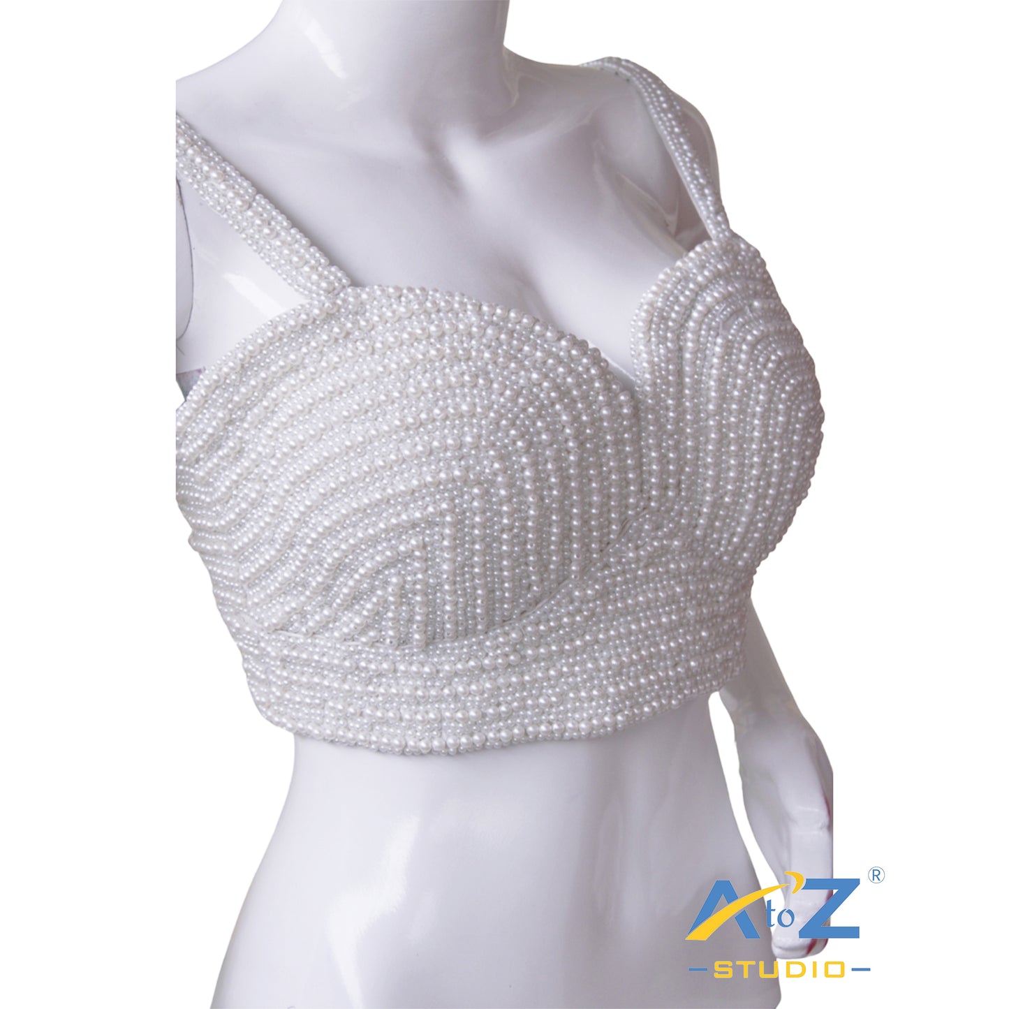 Pearl Work Sleeveless with tie-back closure.