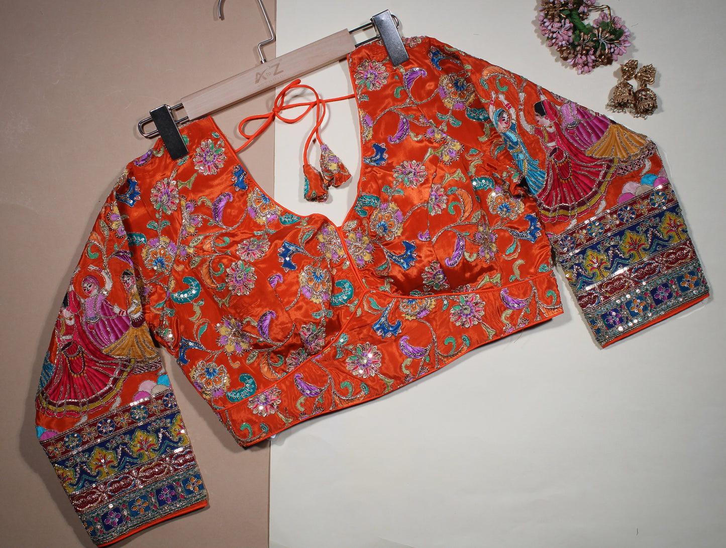 Orange Silk Saree Blouse with Embroidered Traditional Dancer Motif Sleeves