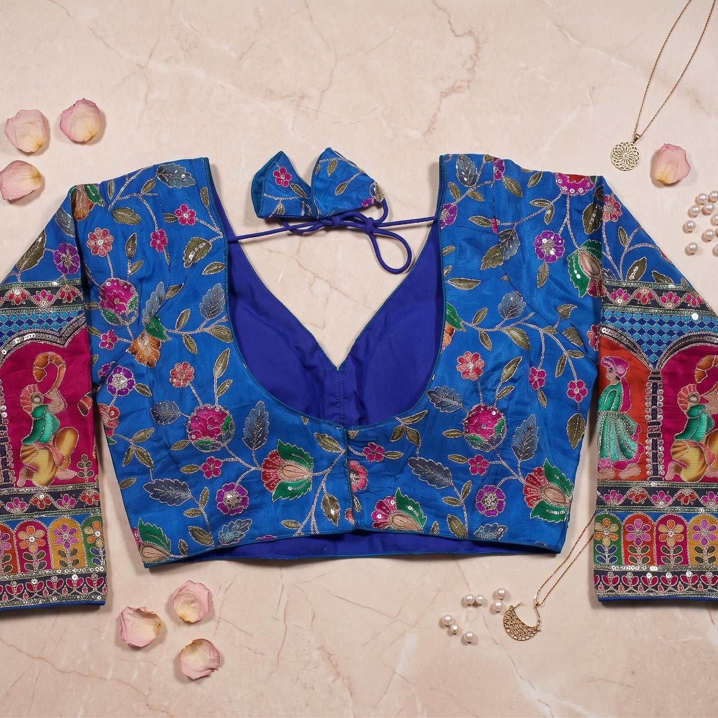 Royal Blue Silk Saree Blouse with Intricate Traditional Royal Figure Sleeves