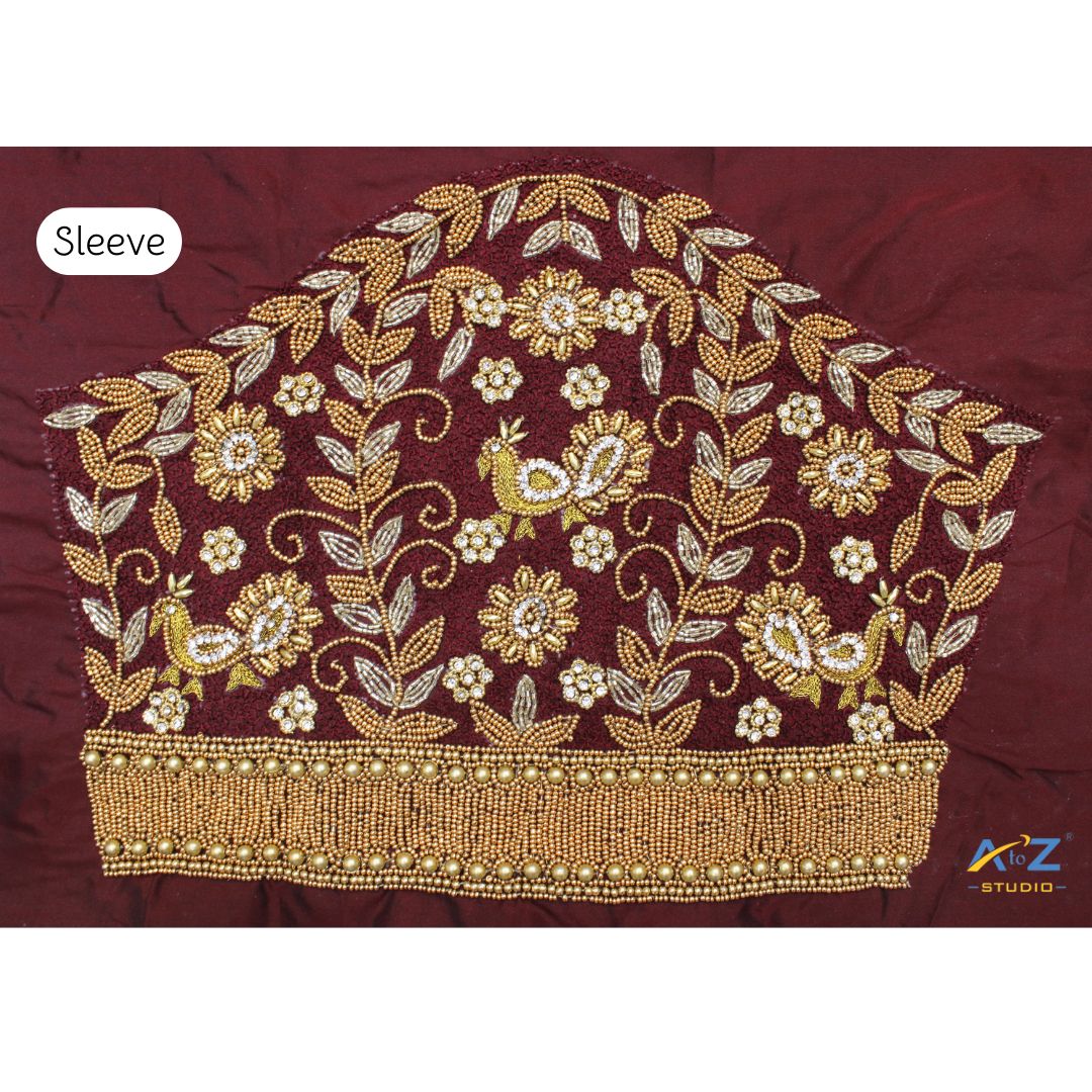 Maroon Maggam Work Blouse Sleeve with Peacock Embroidery – Bridal Blouse Design 2025