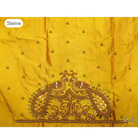 Yellow Maggam Work Blouse Sleeve with Twin Peacock Embroidery – Latest Bridal Blouse Design 2025