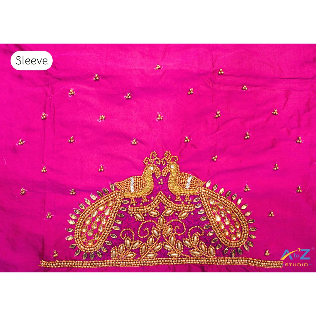 Magenta Pink Maggam Work Blouse Sleeve with Twin Peacock Embroidery – Trending Bridal Blouse Design 2025