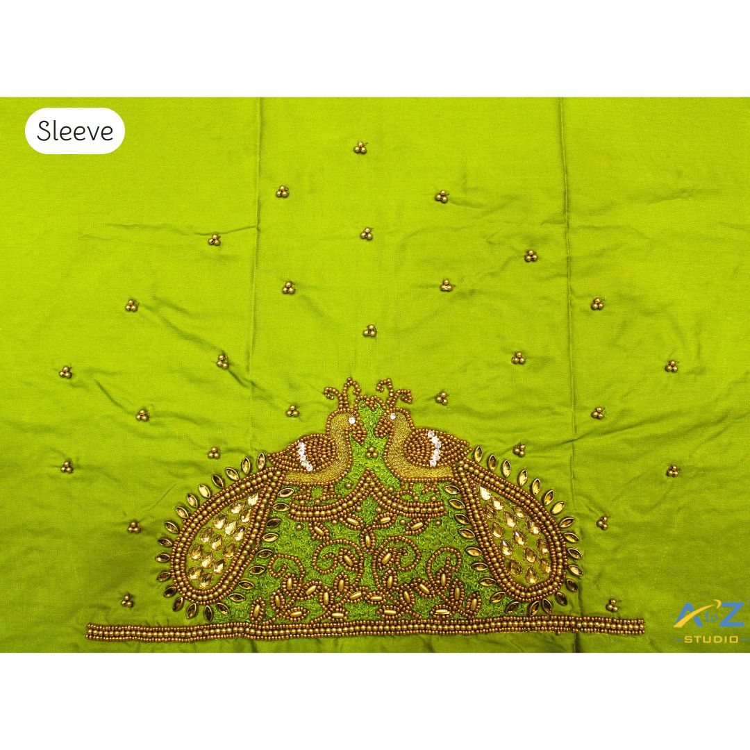 Parrot Green Maggam Work Blouse Sleeve with Twin Peacock Embroidery – Latest Bridal Blouse Design 2025