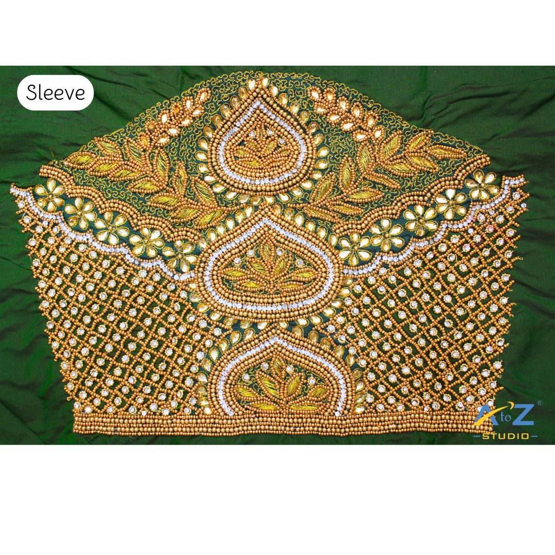 Green Maggam Work Blouse Sleeve with Paisley and Floral Embroidery – Latest Bridal Sleeve Design 2025