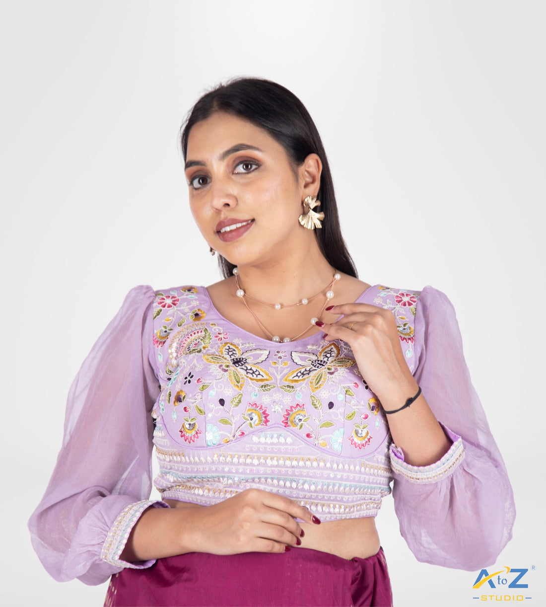 The Art of Draping Sarees with Fancy Blouses for a Fusion Look