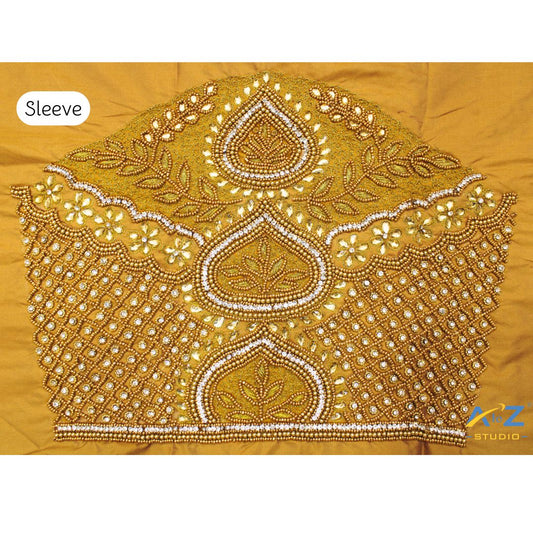 Golden Maggam Work Blouse Sleeve with Stone and Floral Embroidery – Trending Bridal Sleeve Design 2025