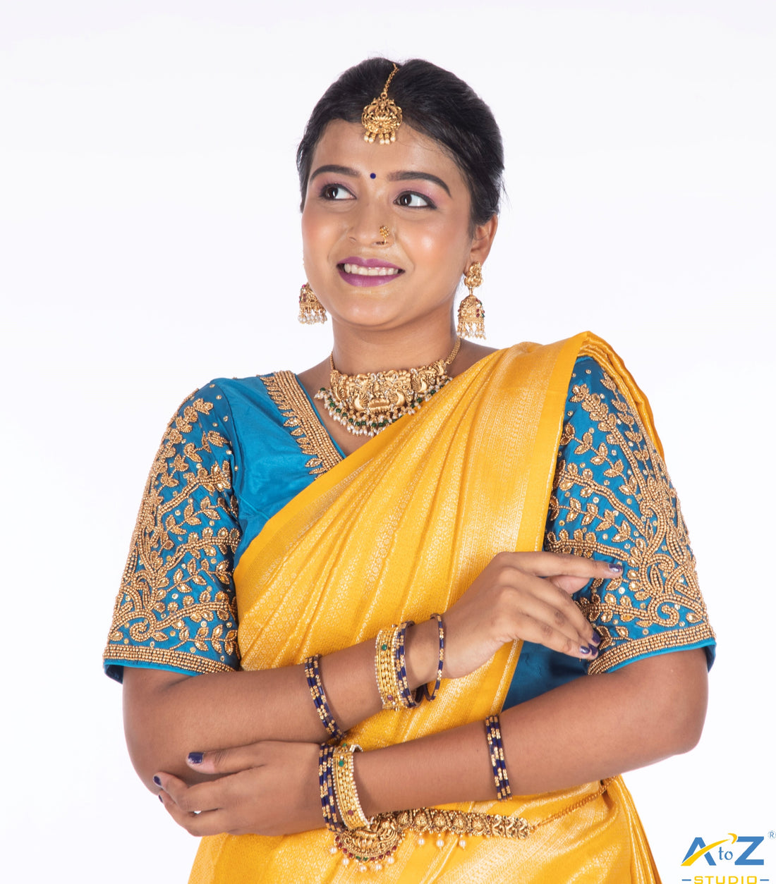 Royal Elegance: Peacock Blue Bridal Blouse Design by A to Z Studio