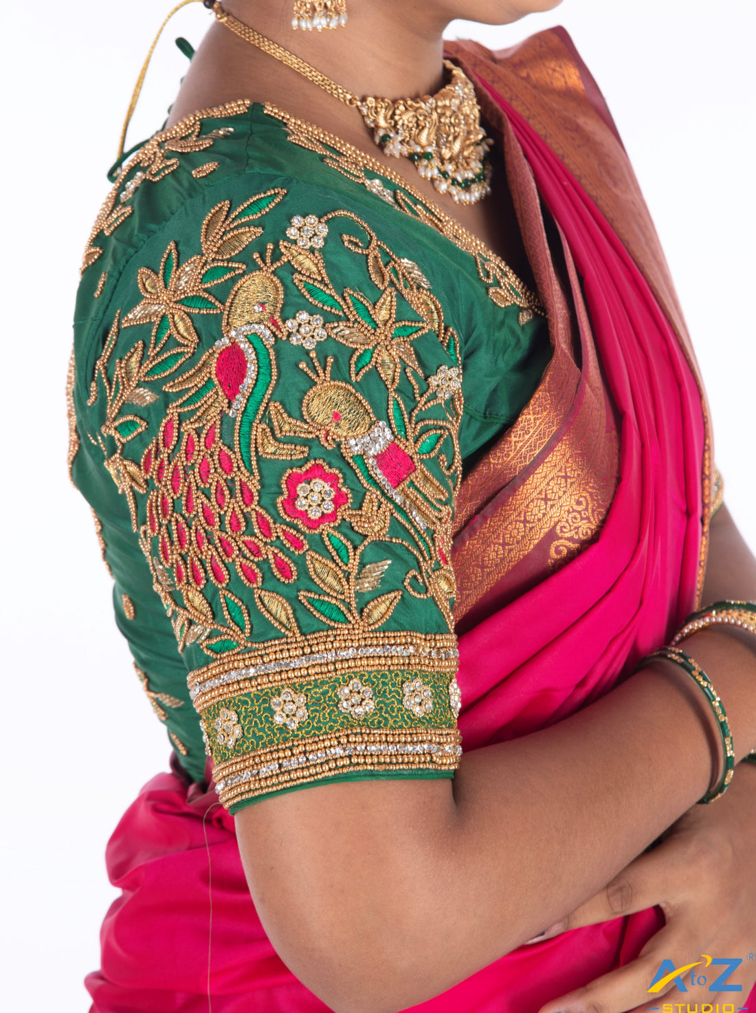 Regal Charm: Dark Green Bridal Blouse Design by A to Z Studio