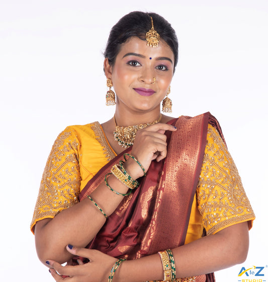 Vibrant Radiance: Mango-Colored Bridal Blouse Design by A to Z Studio