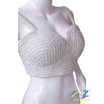 Pearl Work Sleeveless with tie-back closure.