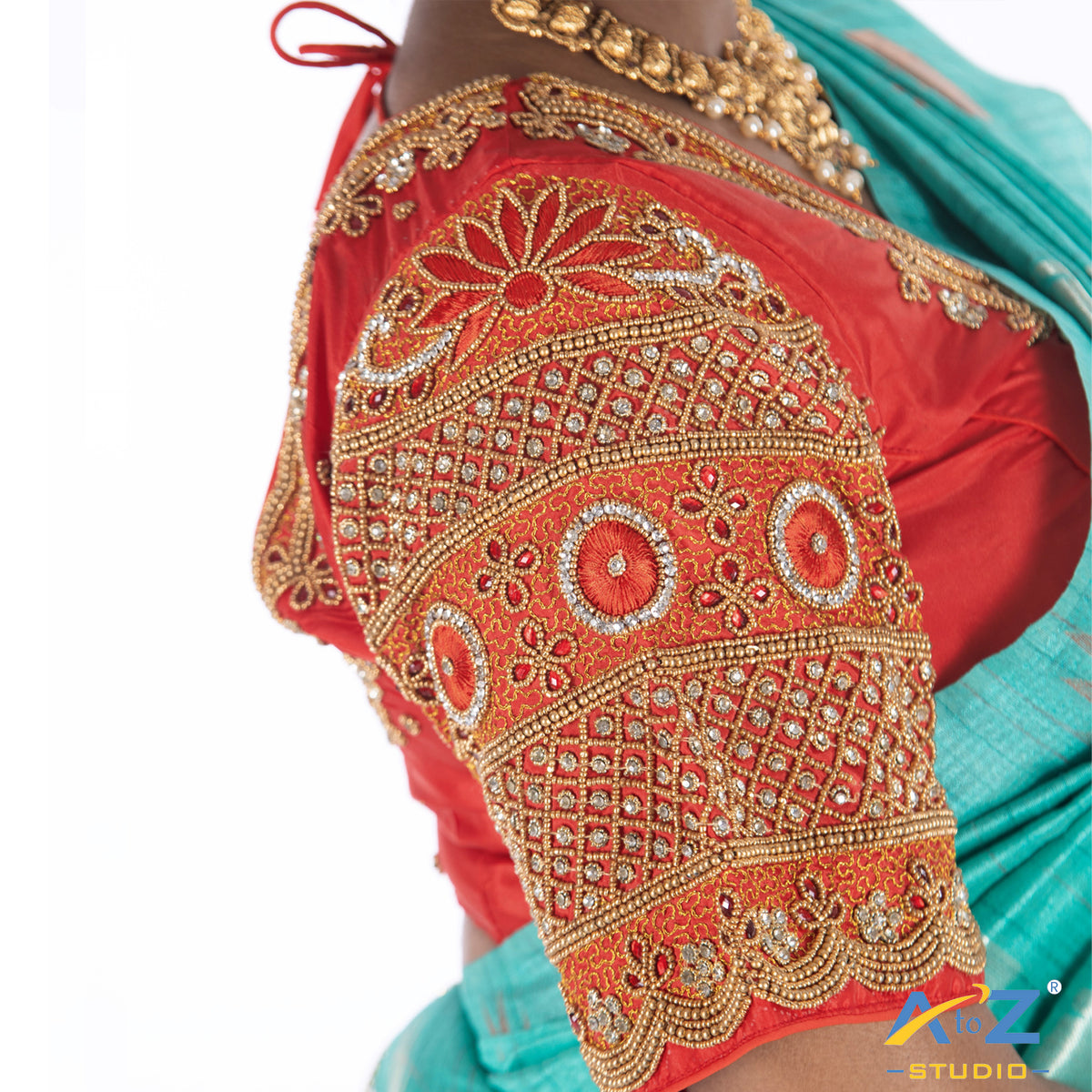 Light Red Silk Cloth Blouse with kundan and chain work Design