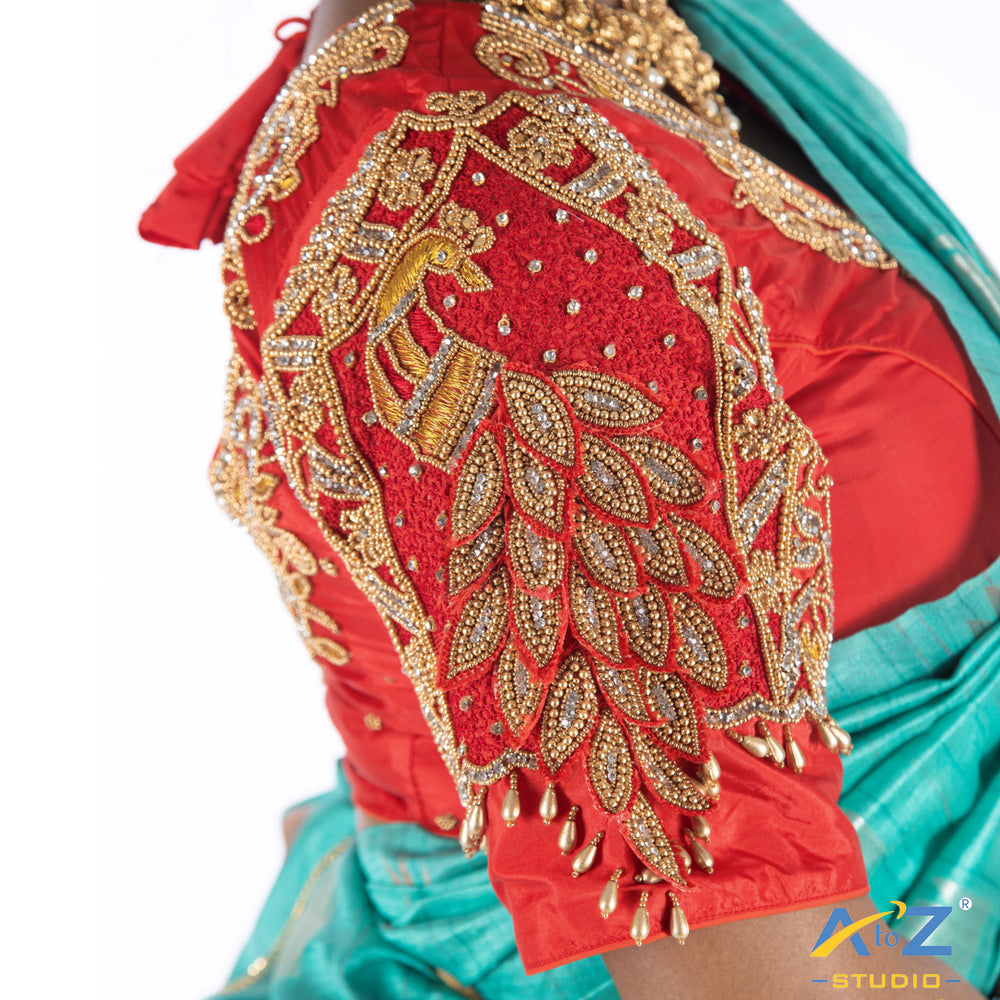 Red Silk Cloth Blouse with Peacock and flower pattern and small peice of diamond Design
