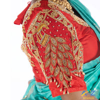 Red Silk Cloth Blouse with Peacock and flower pattern and small peice of diamond Design