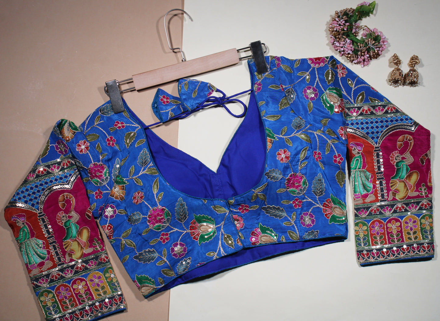 Royal Blue Silk Saree Blouse with Intricate Traditional Royal Figure Sleeves