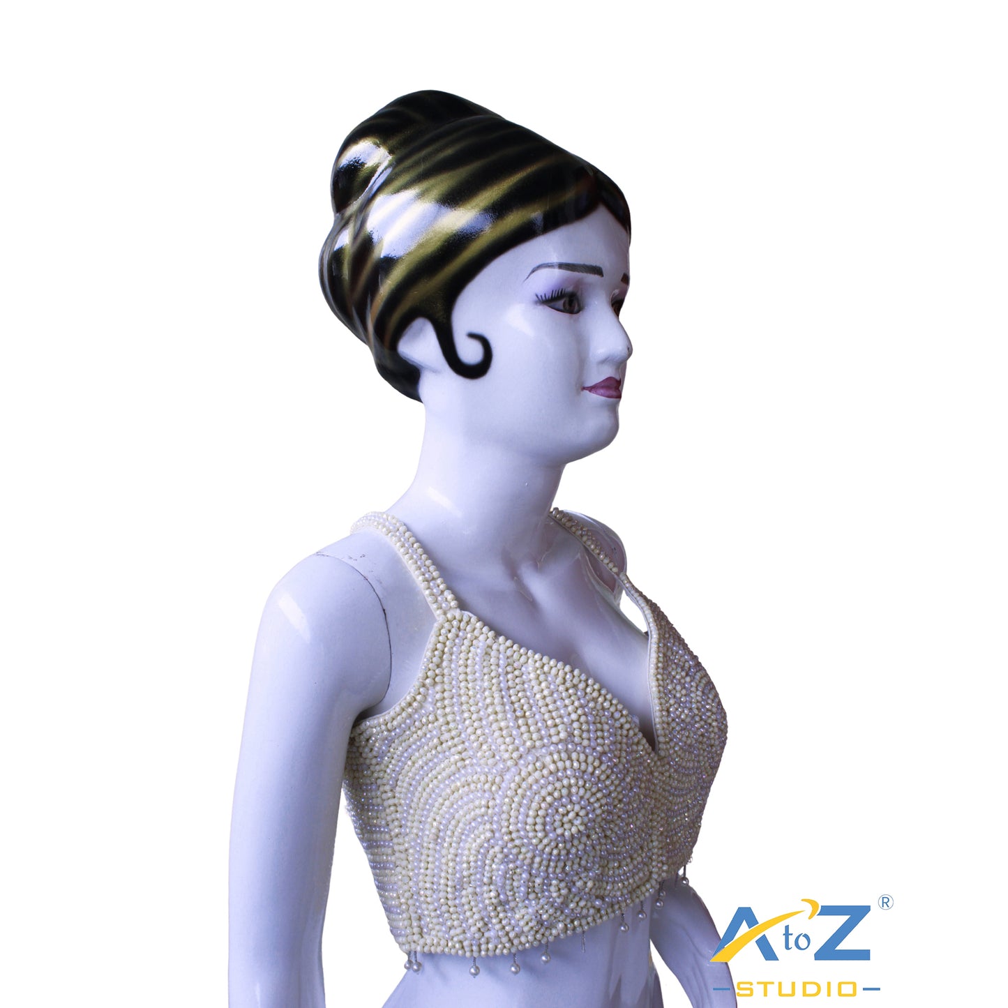 Pearl work white and Yellow pearls arranged in concentric circular patterns