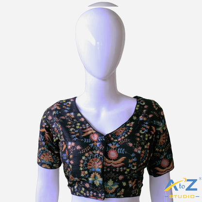 Black base with colorful and dense floral embroidery.