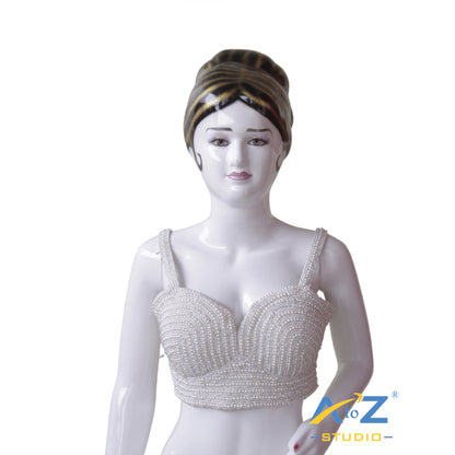 Pearl Work Sleeveless with tie-back closure.