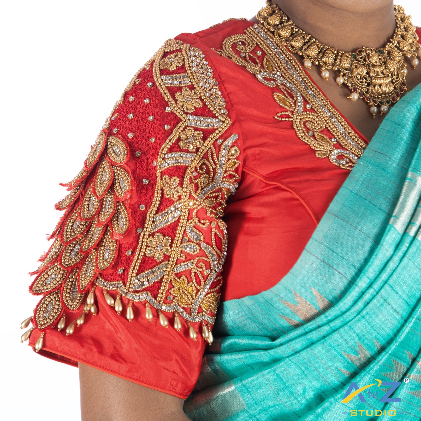 Red Silk Cloth Blouse with Peacock and flower pattern and small peice of diamond Design