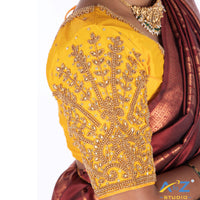 Light yellow Silk Cloth Blouse with Small leaf (like flower pot) and chain work Design