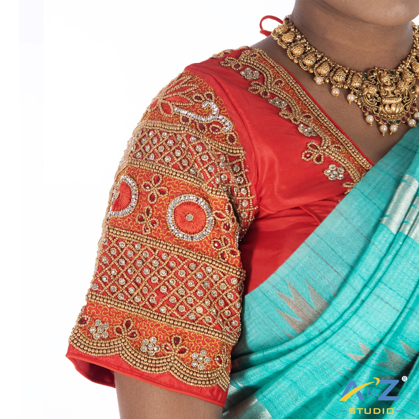 Light Red Silk Cloth Blouse with kundan and chain work Design