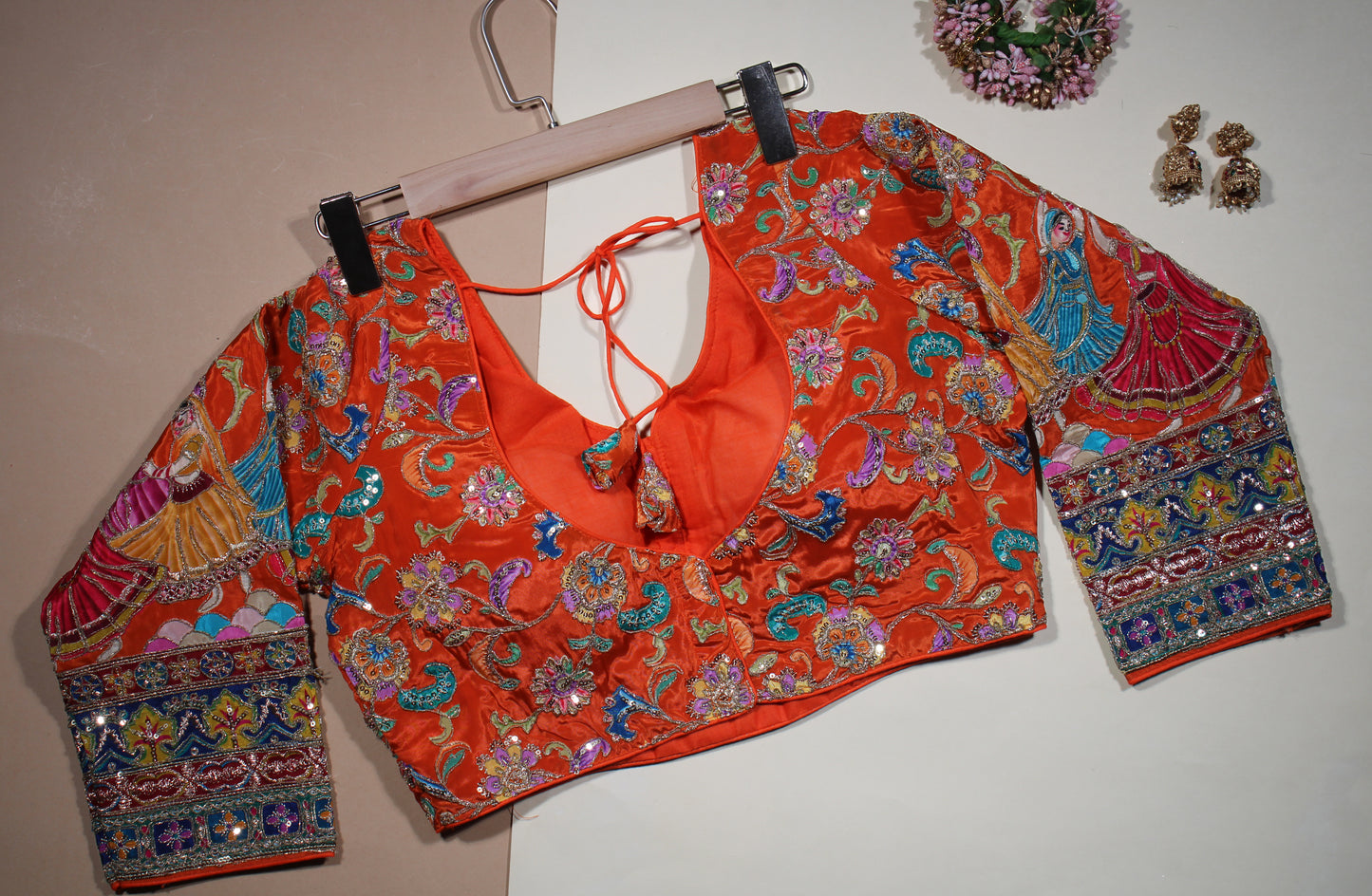 Orange Silk Saree Blouse with Embroidered Traditional Dancer Motif Sleeves