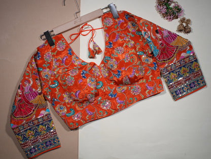 Orange Silk Saree Blouse with Embroidered Traditional Dancer Motif Sleeves