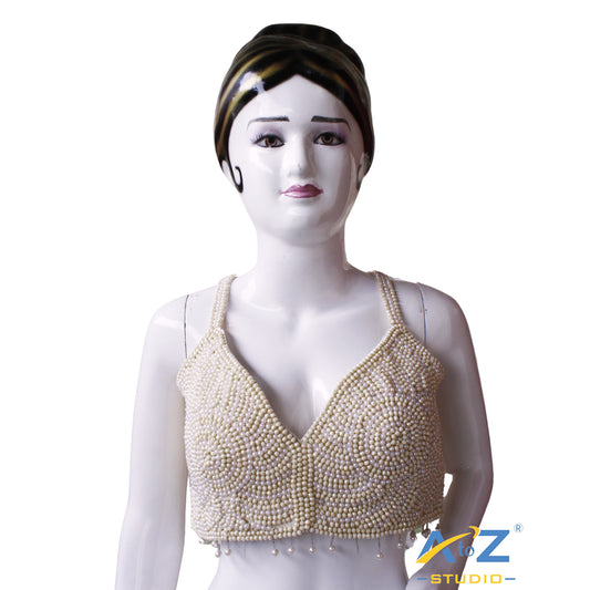 Pearl work white and Yellow pearls arranged in concentric circular patterns