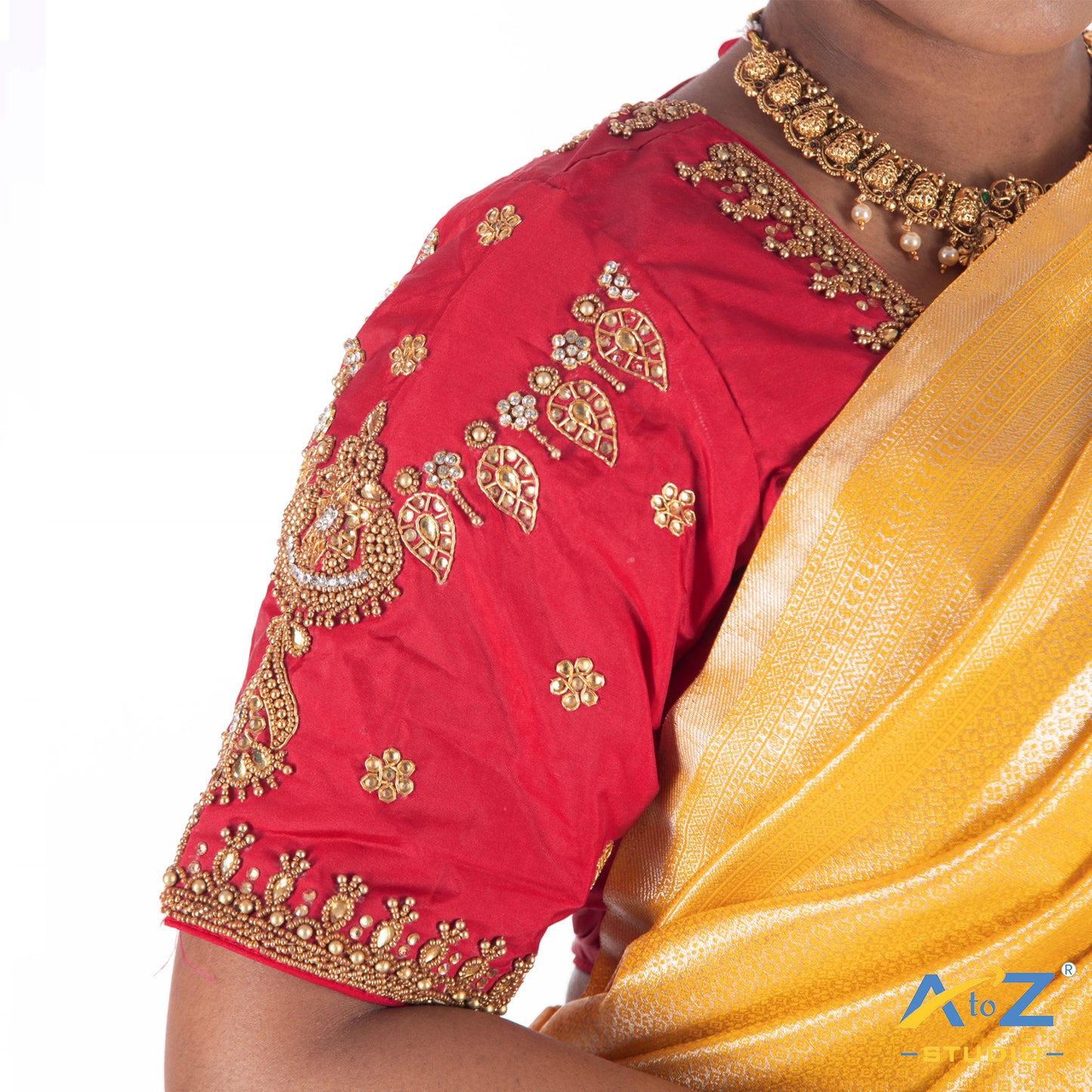 Punch Pink Silk Cloth Blouse with kundan mix and leand and flower Design