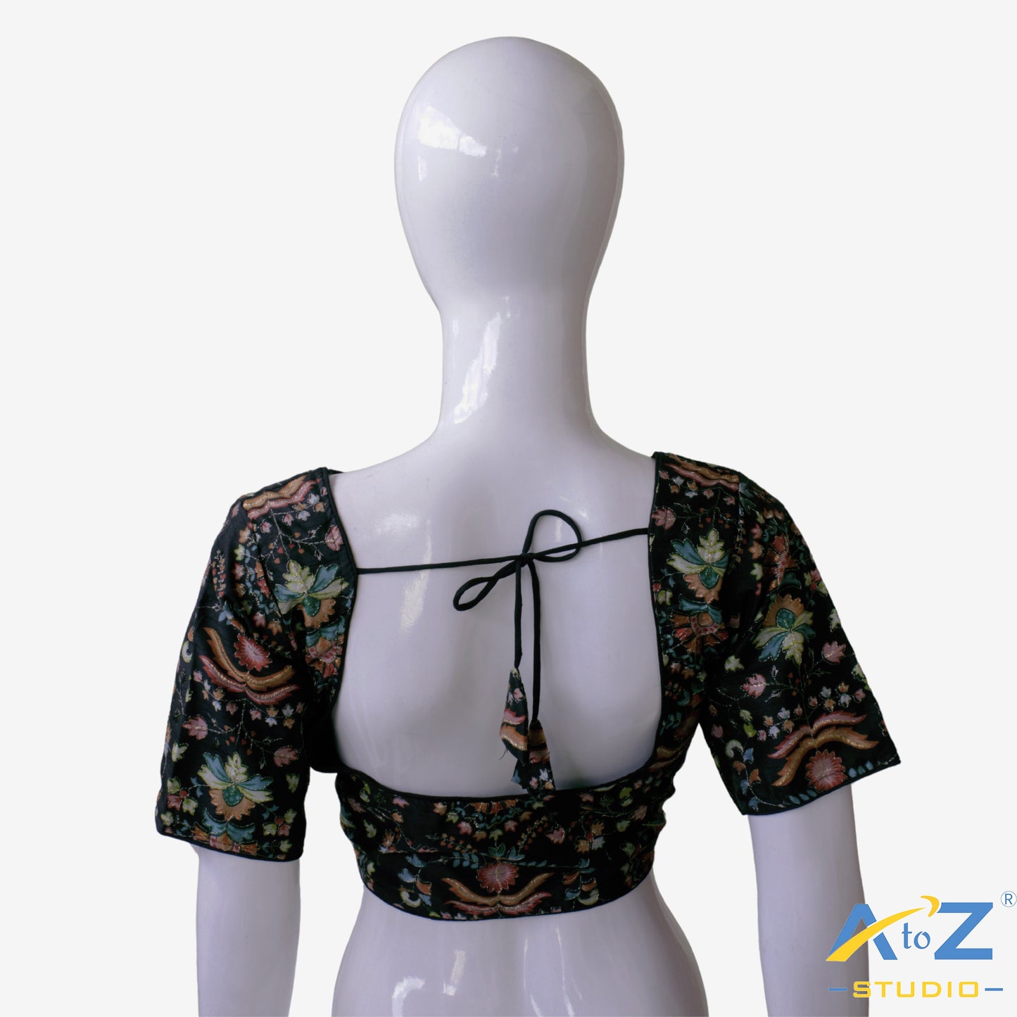 Black base with colorful and dense floral embroidery.