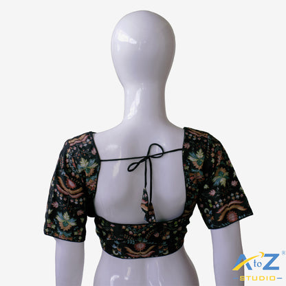 Black base with colorful and dense floral embroidery.