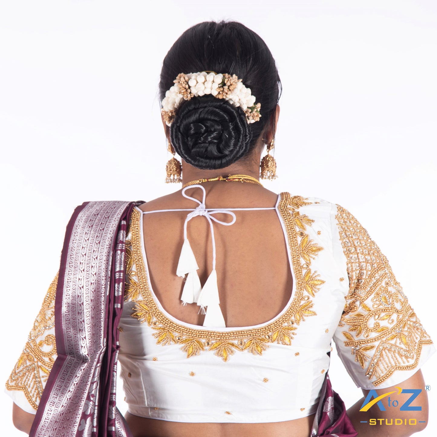 White Silk Cloth Blouse with Deepa and flower and chain design Design