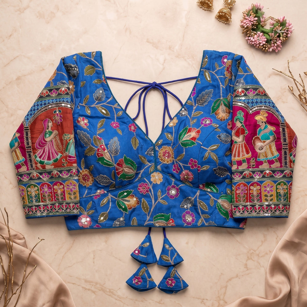 Royal Blue Silk Saree Blouse with Intricate Traditional Royal Figure Sleeves